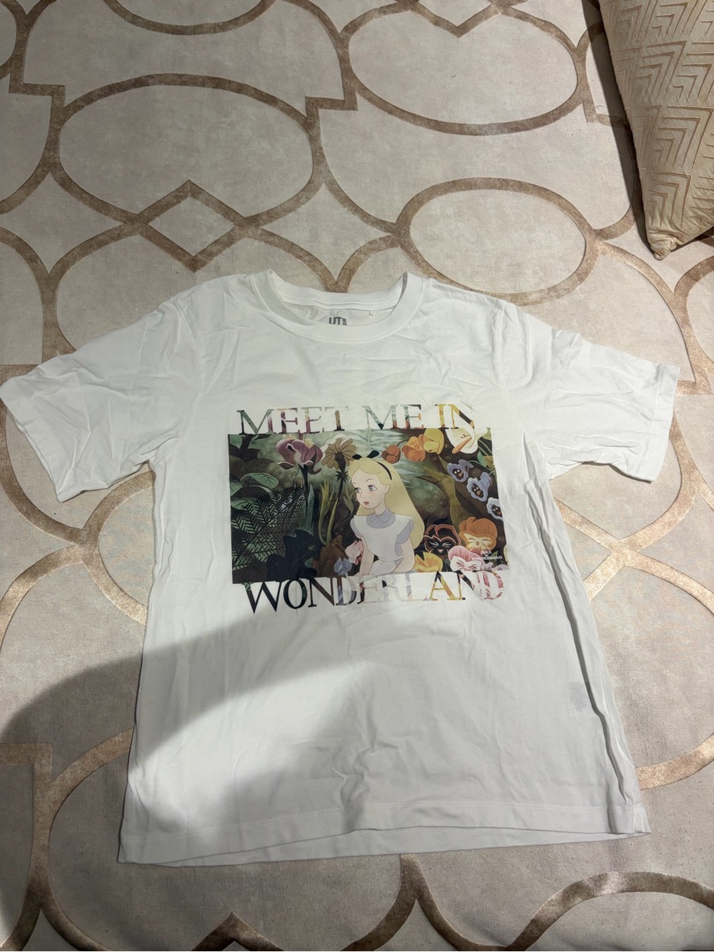 Uniqlo Meet Me in Wonderland tee